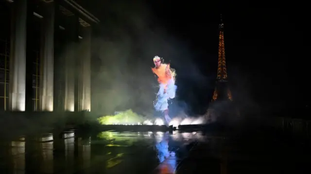 A projection showing Spanish tennis player Rafael Nadal with the Eiffel Tower in the background