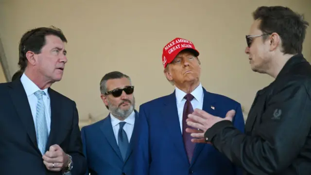 Donald Trump speaks alongside Elon Musk (R) and Senate members including (L-R) Sen. Bill Hagerty (R-TN), and Sen. Ted Cruz