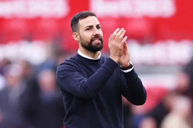 Narcis Pelach, manager of Stoke City acknowledges the fans