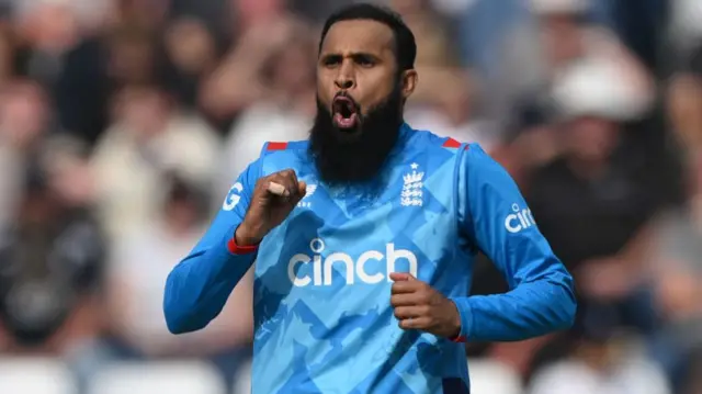 England bowler Adil Rashid reacts