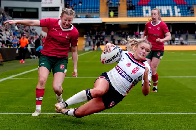 Eboni Partington goes over for a try