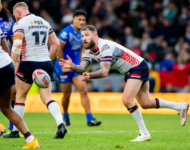 England's Daryl Clark passes the ball