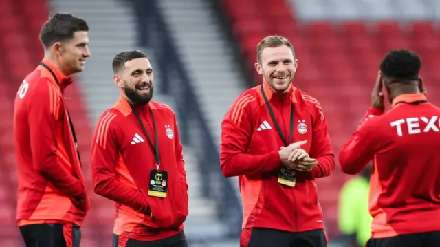 GLASGOW, SCOTLAND - NOVEMBER 02: Aberdeen's Graeme Shinnie and Nicky Devlin during a Premier Sports Cup semi-final match between Celtic and Aberdeen at Hampden Park, on November 02, 2024, in Glasgow, Scotland. (Photo by Roddy Scott / SNS Group)