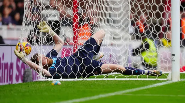 Stoke goalkeeper Viktor Johansson ends up in the back of the net