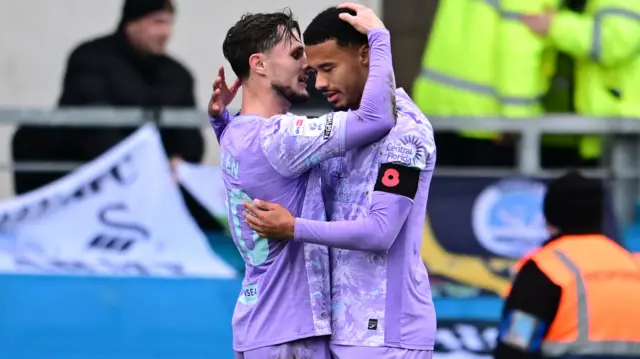 Swansea's Florian Bianchi celebrates his goal at Oxford