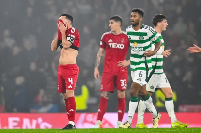 GLASGOW, SCOTLAND - NOVEMBER 02: Aberdeen's Graeme Shinnie looks dejected during a Premier Sports Cup semi-final match between Celtic and Aberdeen at Hampden Park, on November 02, 2024, in Glasgow, Scotland. (Photo by Rob Casey / SNS Group)