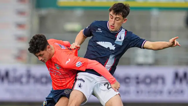 Greenock Morton's Michael Garrity and Falkirk's Keelan Adams