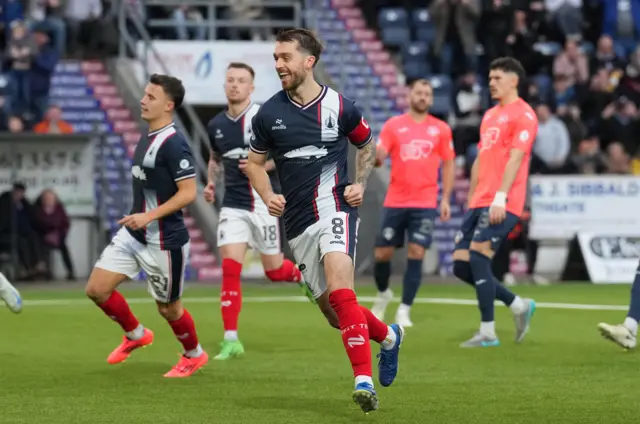 Brad Spencer celebrates after scoring a penalty for Falkirk against Greenock Morton