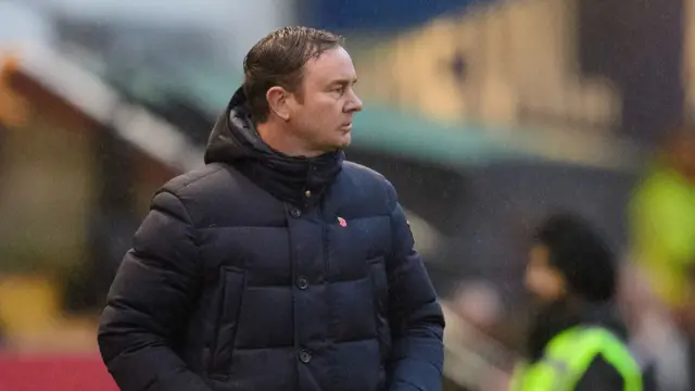 Morecambe boss Derek Adams