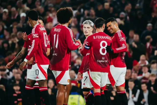 Manchester United players celebrate a goal v Leicester in the EFL cup