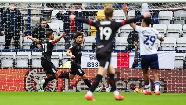 Yu Hirakawa of Bristol City (7) scores his sides first goal of the match and celebrates with team-mates