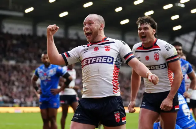 Liam Marshall celebrates