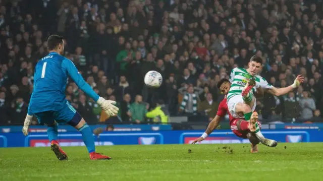 Celtic's Ryan Christie scores the opening goal to make it 1-0.