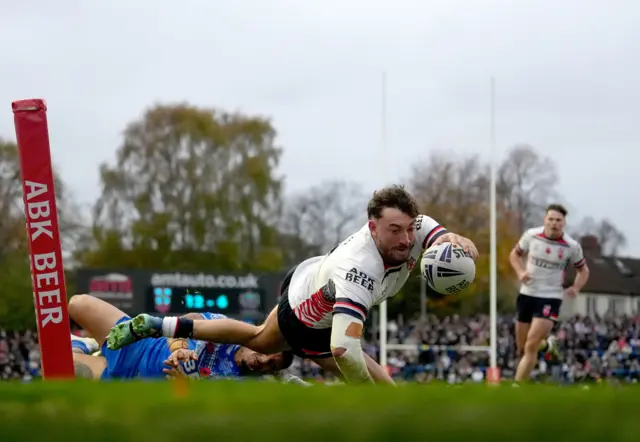 Matty Ashton goes over for a try