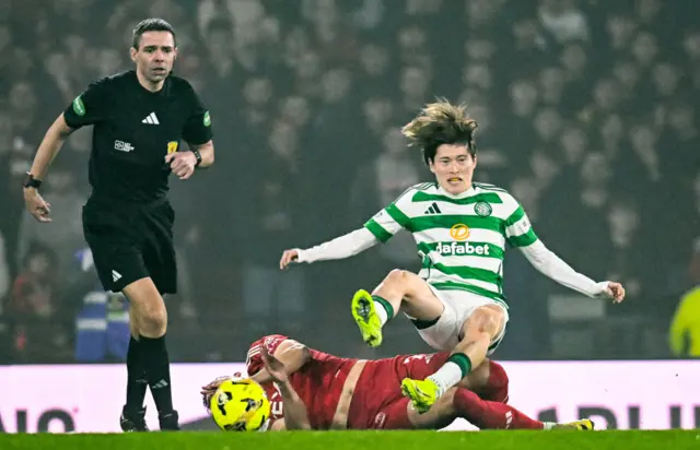 GLASGOW, SCOTLAND - NOVEMBER 02: Celtic's Kyogo Furuhashi (R) and Aberdeen's Jamie McGrath in action during a Premier Sports Cup semi-final match between Celtic and Aberdeen at Hampden Park, on November 02, 2024, in Glasgow, Scotland. (Photo by Rob Casey / SNS Group)