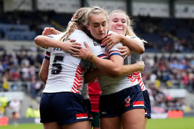 England players celebrate a try