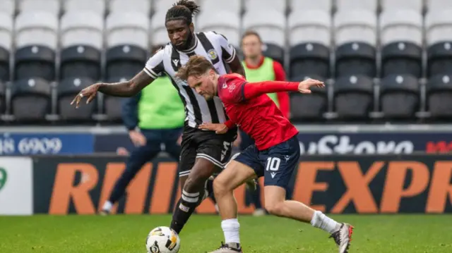 St Mirren's Richard Taylor and Ross County's Noah Chilvers