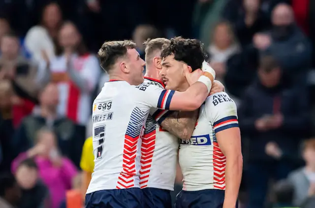 Herbie Farnworth is congratulated on scoring a try against Samoa.