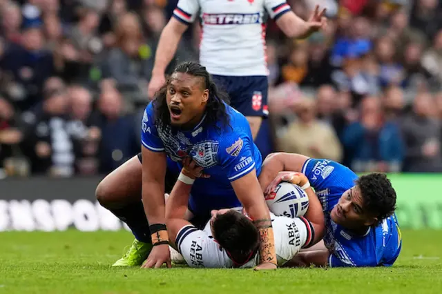 Luciano Leilua of Samoa reacts to being penalised for a high tackle