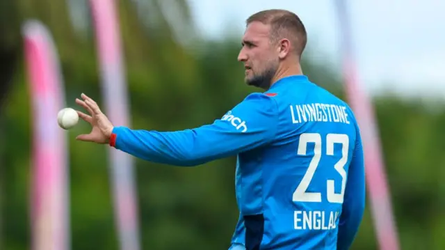 Liam Livingstone of England prepares to bowl