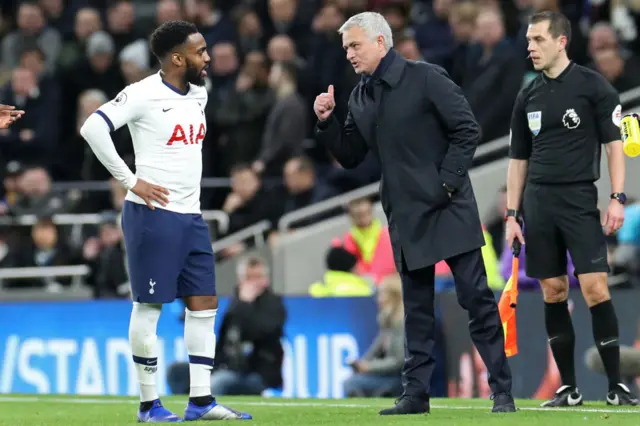 Danny Rose of Tottenham speaks to then-Spurs manager Jose Mourinho.