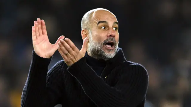 Manchester City manager Pep Guardiola applauds