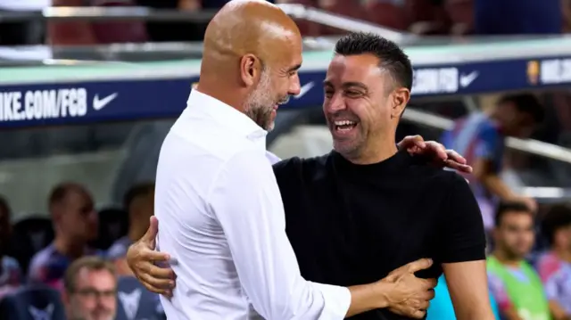 Pep Guardiola and Xavi
