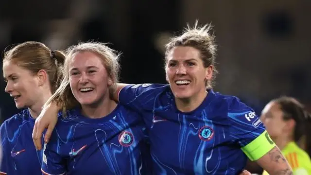 Wieke Kaptein celebrates scoring Chelsea's second goal with captain Millie Bright.