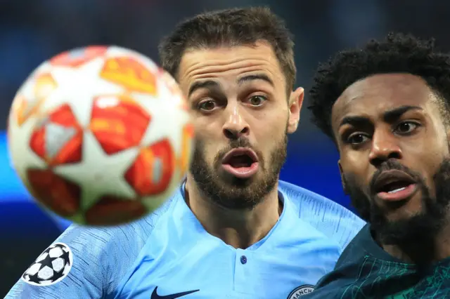 Bernardo Silva (left) of Manchester City and Danny Rose (right) of Tottenham Hotspur challenge for the ball.