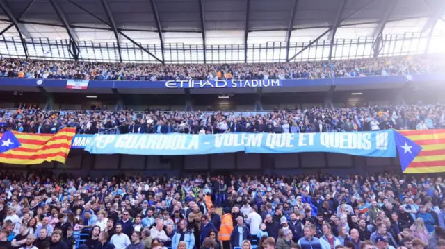 Manchester City fans banner asking for Pep Guardiola to stay