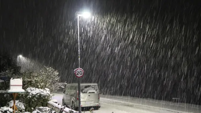 Heavy snow was falling in Lochcarron in the Highlands