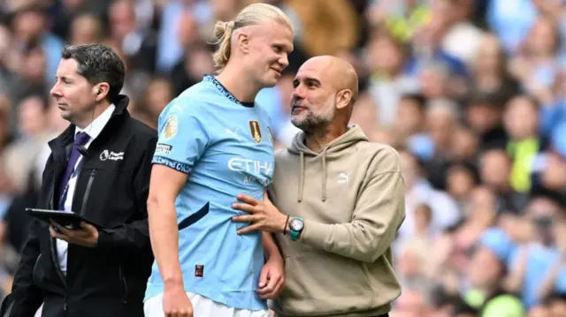 Pep Guardiola and Erling Haaland