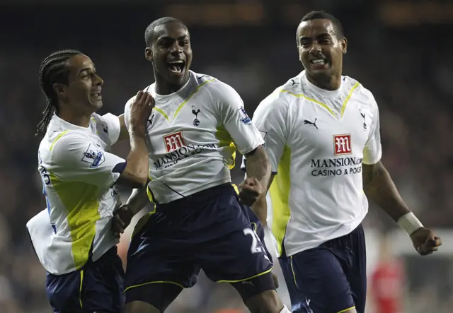 Danny Rose celebrates scoring for Spurs on his Premier League debut, alongside Benoit Assou-Ekotto (left) and Tom Huddlestone (right)