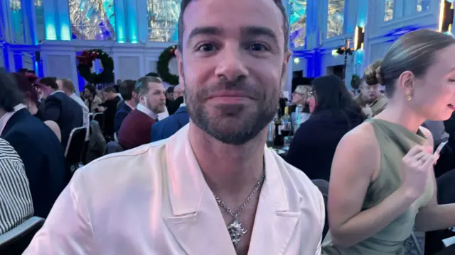 Ben Starr wearing a Final Fantasy VIII necklace