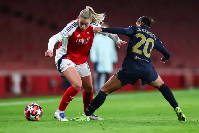 Alessia Russo of Arsenal battles for possession with Estelle Cascarino