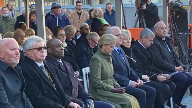 The Duchess of Edinburgh observes the one-minute silence at the service