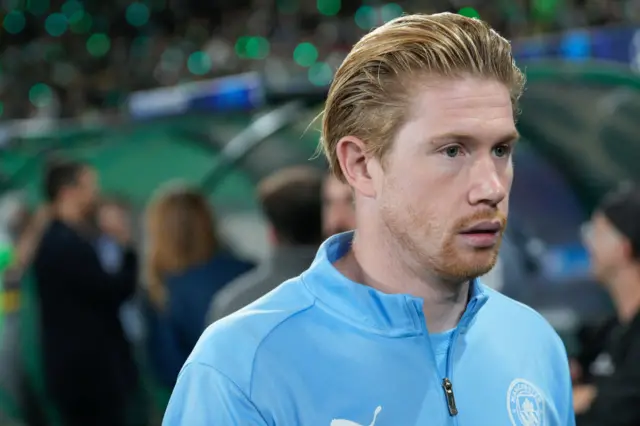 Kevin de Bruyne looks on