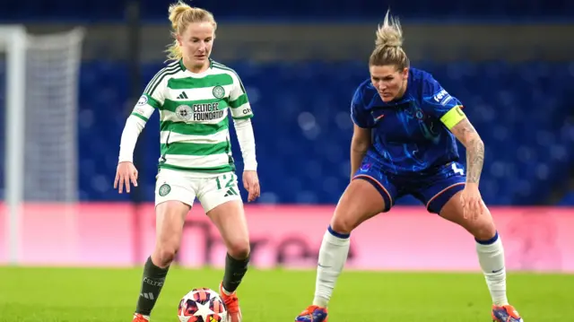 Celtic's Murphy Agnew shields the ball from Chelsea's Millie Bright