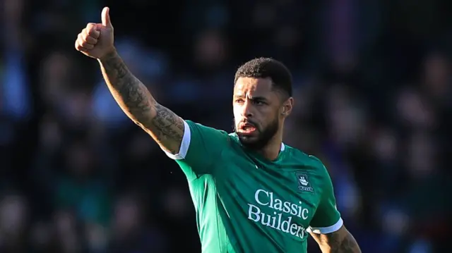 Andre Gray celebrating scoring for Plymouth