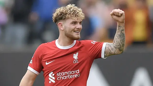 Liverpool's Harvey Elliott celebrates with a clenched fist