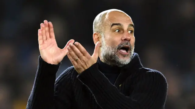 Manchester City manager Pep Guardiola applauds