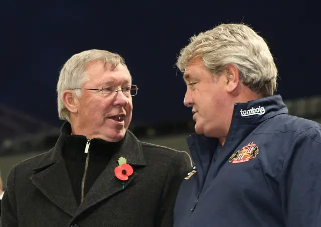 Sir Alex Ferguson (L) of Manchester United and Steve Bruce