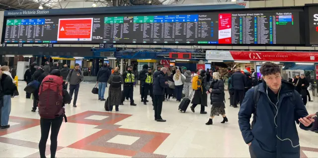 The departure boards at Victoria Station