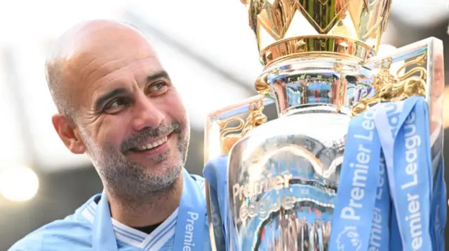 Pep Guardiola smiles next to the trophy after winning his sixth Premier League title in 2024