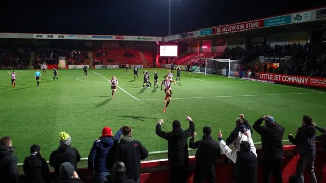 Joel Colwill celebrates the winning goal against Tranmere