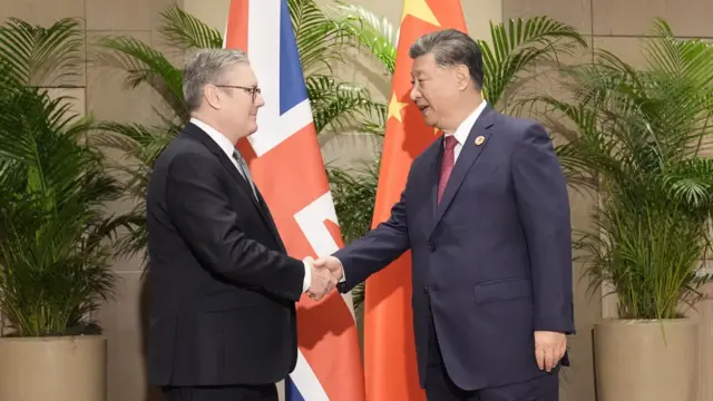 Prime Minister Sir Keir Starmer shaking hands with President Xi Jinping of China