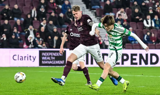 EDINBURGH, SCOTLAND - NOVEMBER 23: Celtic's Kyogo Furuhashi (R) misses a second half chance during a William Hill Premiership match between Heart of Midlothian and Celtic at Tynecastle Park on November 23, 2024, in Edinburgh, Scotland. (Photo by Paul Devlin / SNS Group)