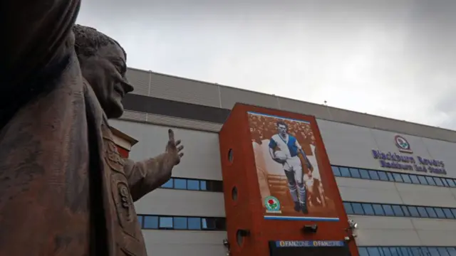 general view of Ewood Park Stadium the home of Blackburn Rovers from the side of the Jack Walker statue