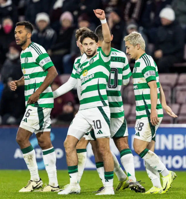 EDINBURGH, SCOTLAND - NOVEMBER 23: Celtic's Nicolas Kuhn celebrates as he scores to make it 2-0 during a William Hill Premiership match between Heart of Midlothian and Celtic at Tynecastle Park on November 23, 2024, in Edinburgh, Scotland. (Photo by Ross Parker / SNS Group)