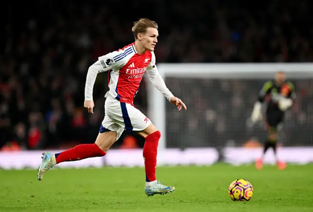 Martin Odegaard of Arsenal controls the ball